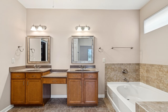 bathroom with vanity and a bath