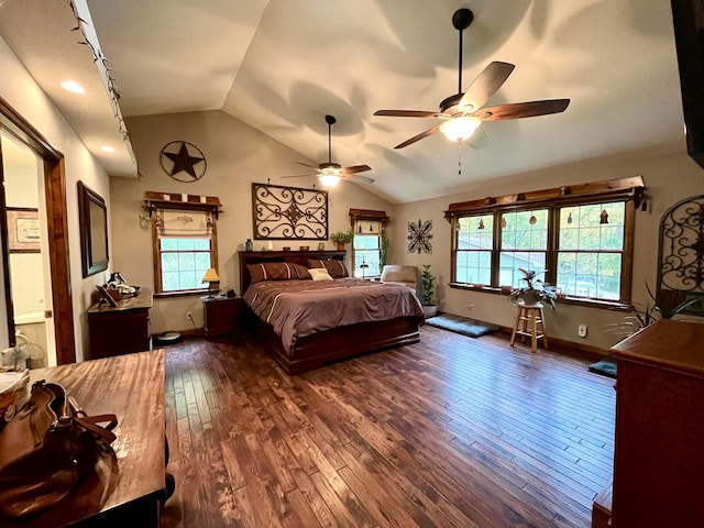 bedroom with vaulted ceiling, multiple windows, dark wood-type flooring, and ceiling fan