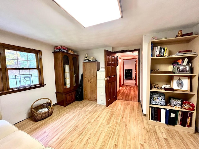 living area with light hardwood / wood-style floors