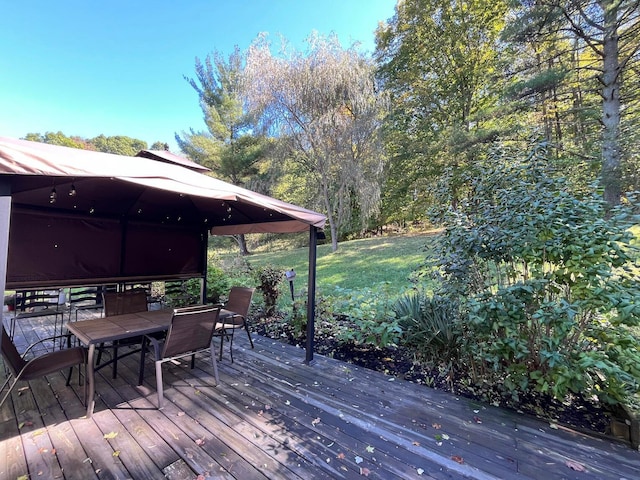 deck featuring a lawn