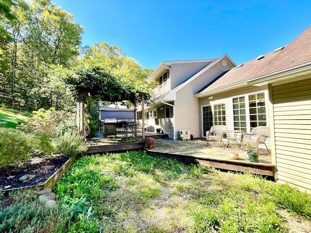 view of yard featuring a deck