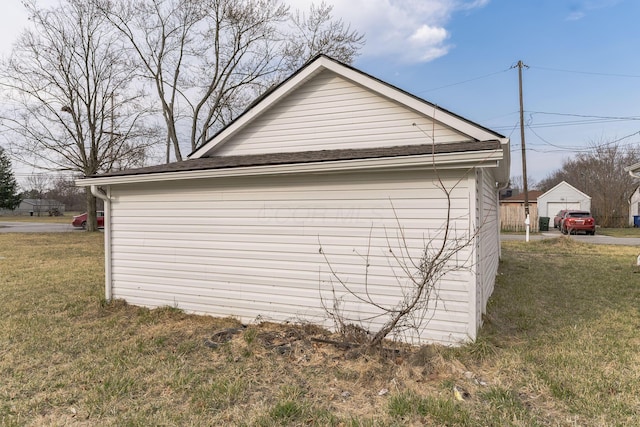 view of property exterior with a lawn