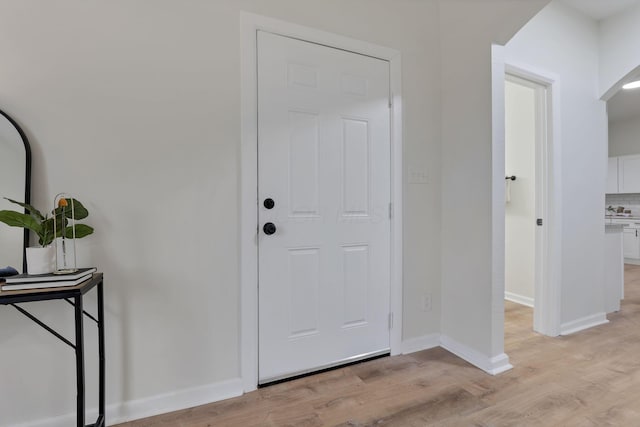 entrance foyer featuring light wood-type flooring