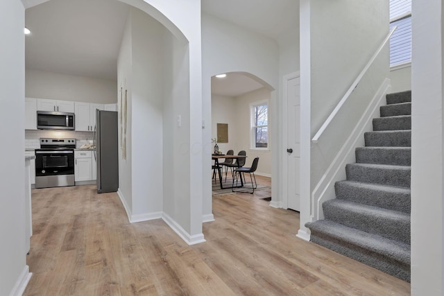 entrance foyer featuring light wood-type flooring