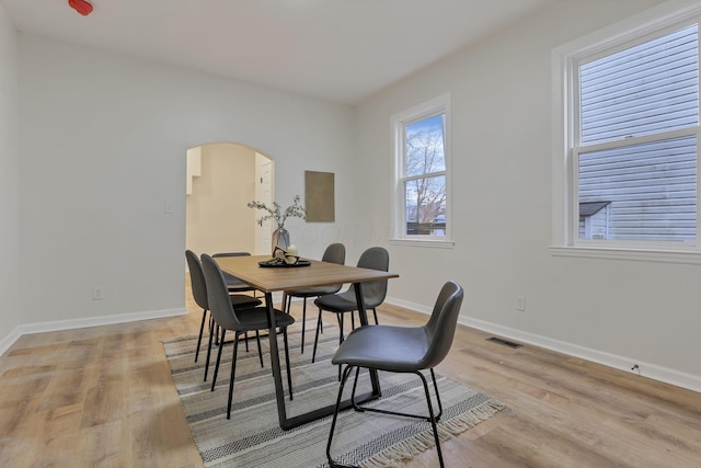 dining space featuring light hardwood / wood-style flooring