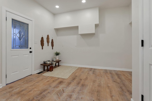 foyer entrance featuring light hardwood / wood-style flooring