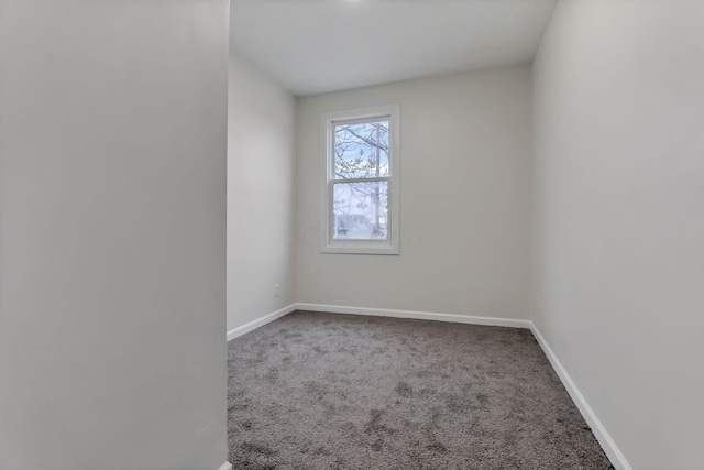 unfurnished room with carpet flooring