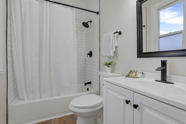 full bathroom featuring toilet, vanity, shower / bath combination with curtain, and hardwood / wood-style flooring