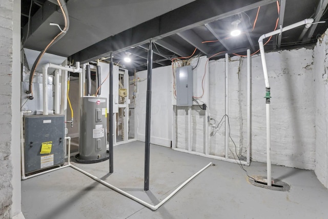 basement with electric panel, heating unit, and water heater