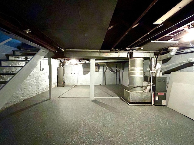 341 E 18th Ave, Columbus, OH 43201 - unfinished below grade area featuring stairway and gas water heater