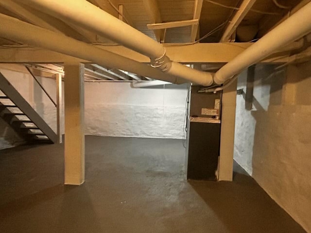 basement featuring heating unit