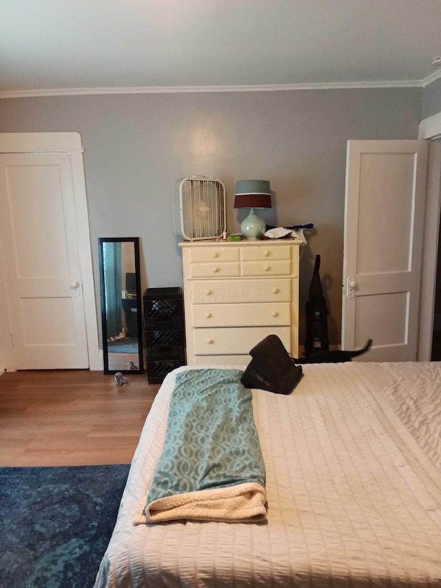 341 E 18th Ave, Columbus, OH 43201 - bedroom with wood finished floors and ornamental molding