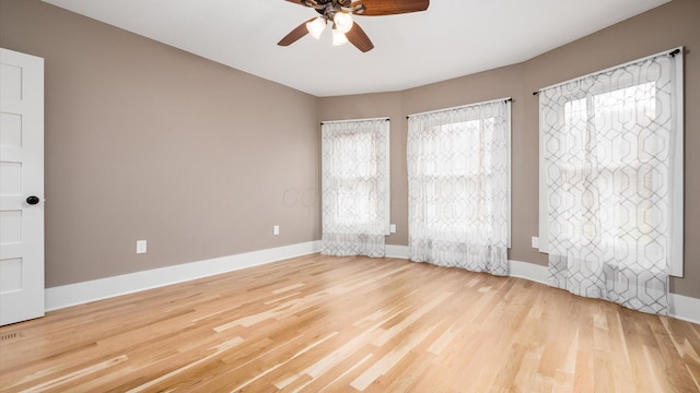 unfurnished bedroom with light hardwood / wood-style flooring and ceiling fan