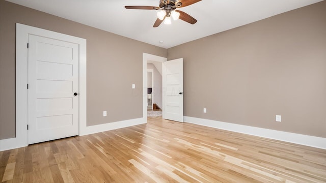 unfurnished bedroom with light hardwood / wood-style flooring and ceiling fan