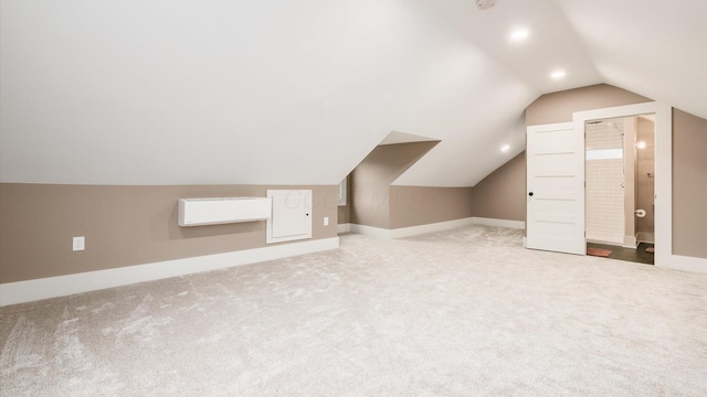 bonus room featuring carpet and lofted ceiling