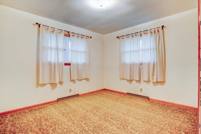 unfurnished room with carpet flooring