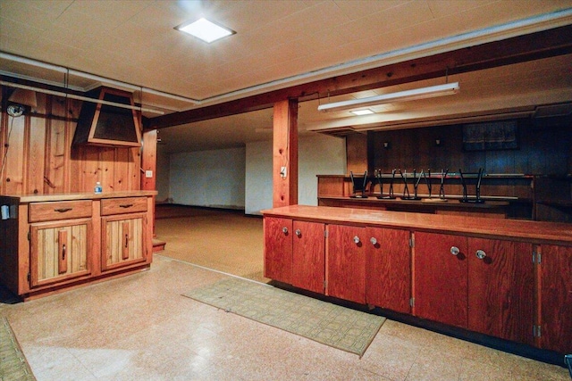 kitchen with wood walls