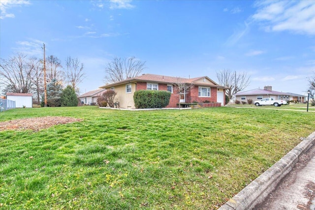 ranch-style house with a garage and a front lawn