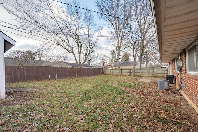 view of yard with central AC