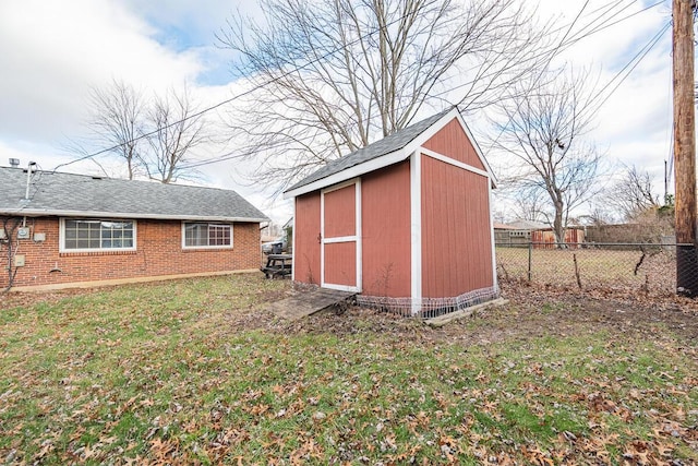 view of outdoor structure with a yard