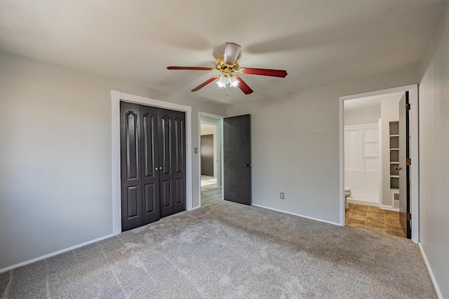 unfurnished bedroom featuring ceiling fan, light carpet, and a closet