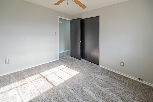 unfurnished bedroom with light carpet, a closet, and ceiling fan