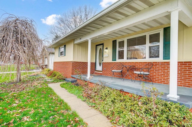 entrance to property with covered porch