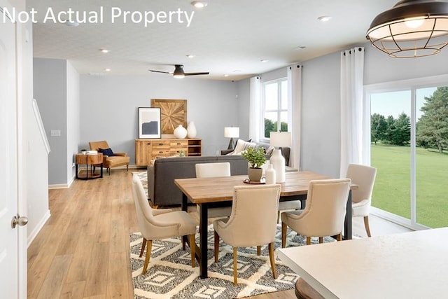 dining area with light wood finished floors, recessed lighting, and baseboards