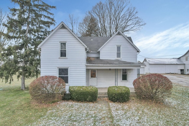 view of front of home featuring a porch and a front yard