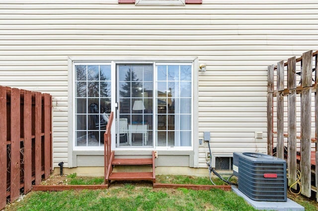 view of side of property featuring cooling unit