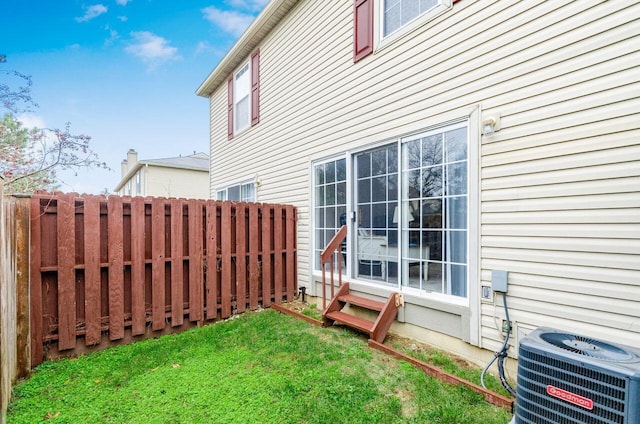 view of yard featuring central AC