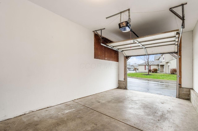 garage featuring a garage door opener