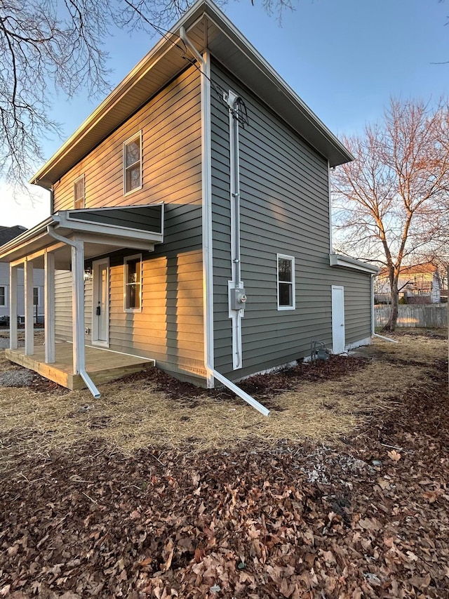 back of property with a patio area