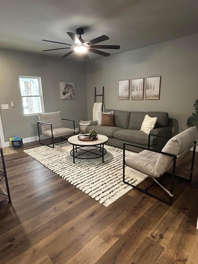 living room with ceiling fan and hardwood / wood-style floors