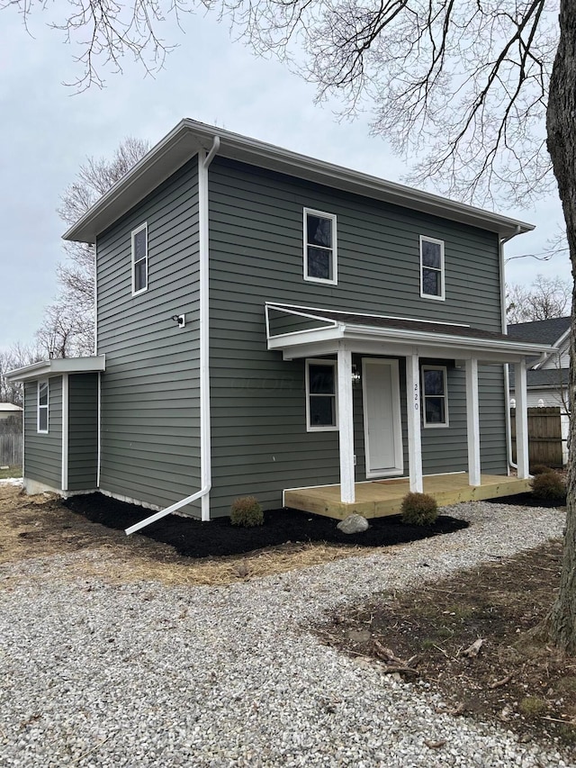 view of front property featuring covered porch