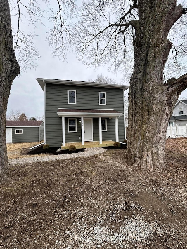 view of property with covered porch