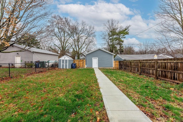 view of yard with a storage unit