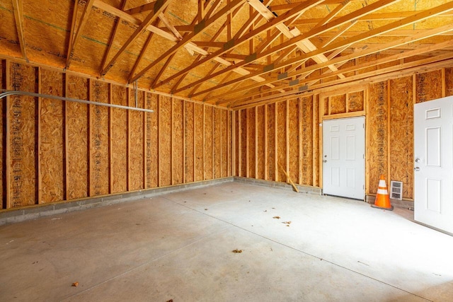 misc room with concrete flooring