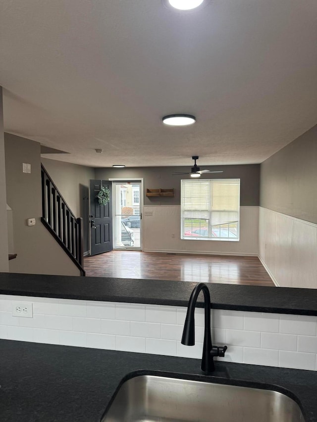 kitchen with ceiling fan and sink