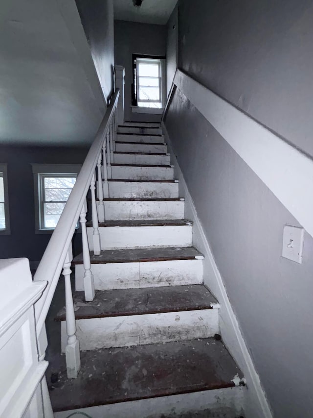 staircase featuring a healthy amount of sunlight