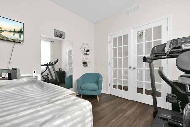 bedroom featuring french doors and dark hardwood / wood-style floors