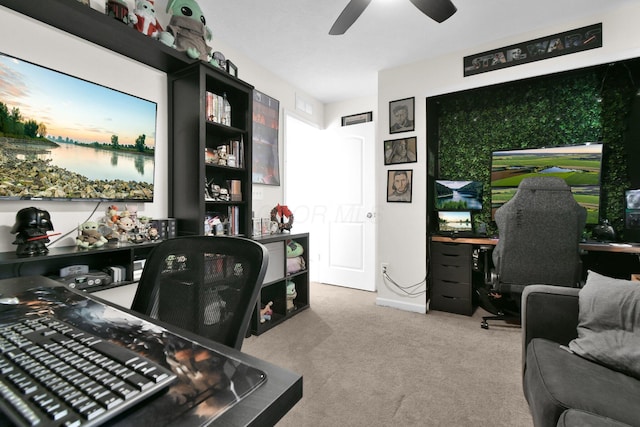 office with ceiling fan and light carpet