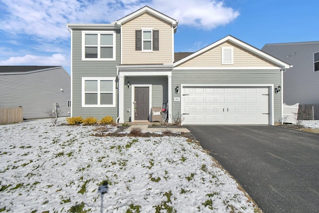 front of property with a garage