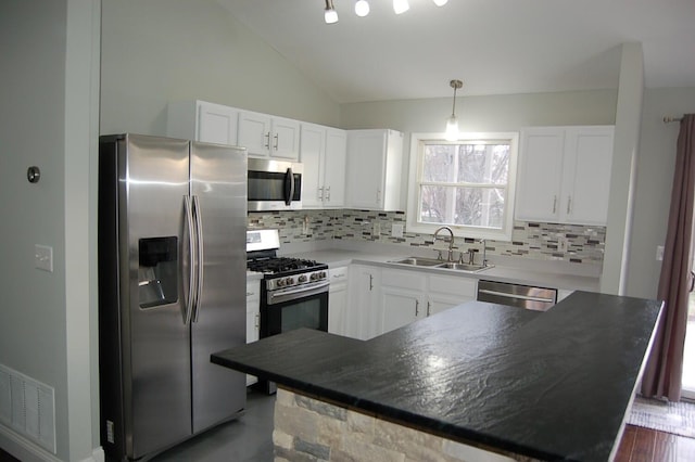 kitchen with white cabinets, sink, and stainless steel appliances