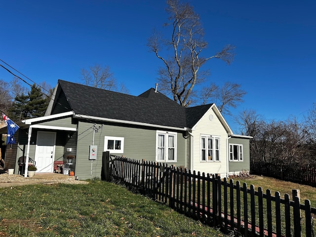 view of property exterior featuring a yard