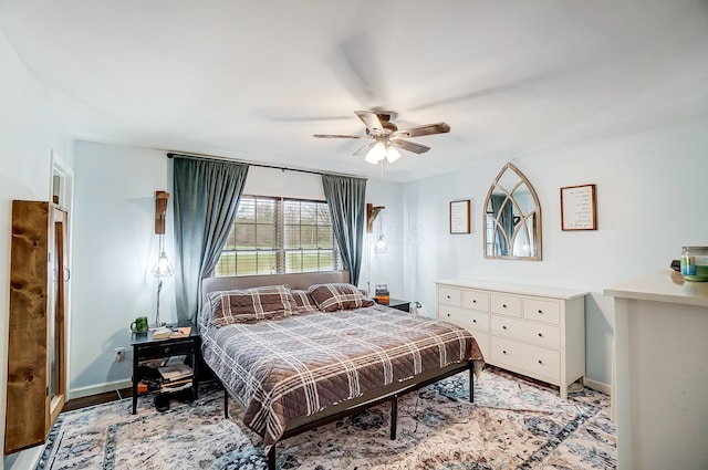 bedroom featuring ceiling fan and light wood-type flooring