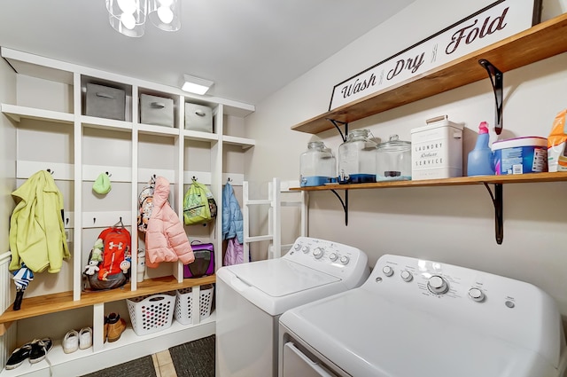 clothes washing area featuring washing machine and dryer