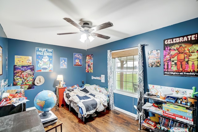 bedroom featuring ceiling fan and hardwood / wood-style floors