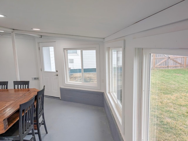 dining room with concrete floors