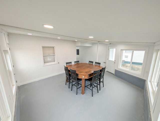 dining area with concrete floors